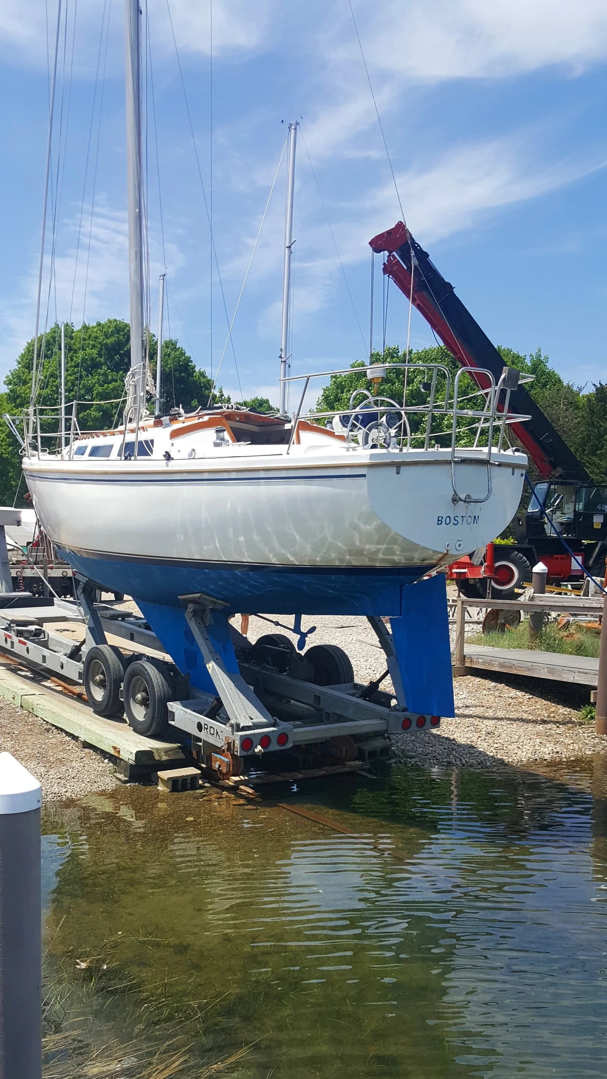 Boats moored on the Pocasset River at Scallop Bay Marina